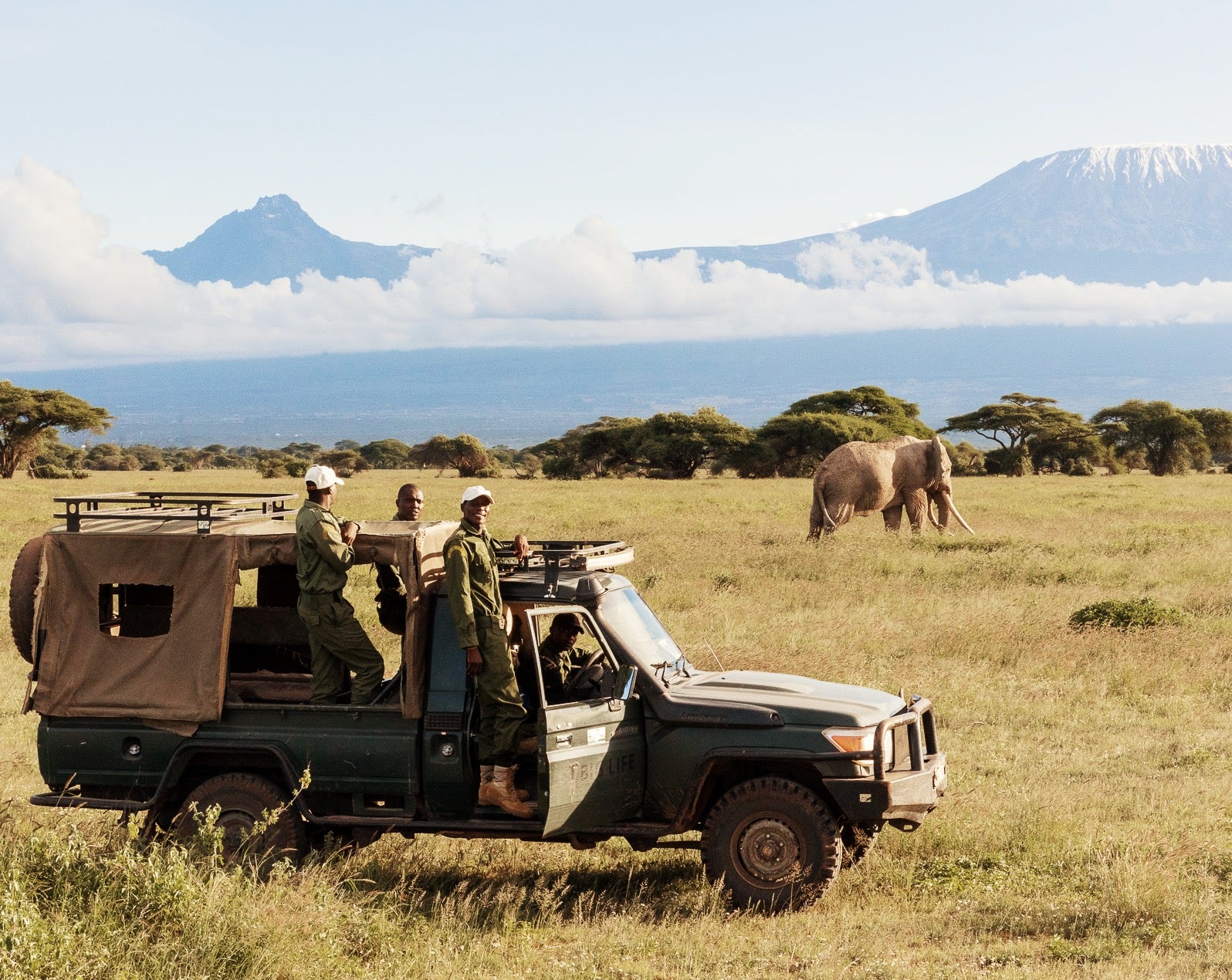 Big Life Foundation rangers in Kenya with the elephants they protect