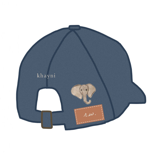Organic cotton cap denim with baby elephant embroidery and leather patch detail