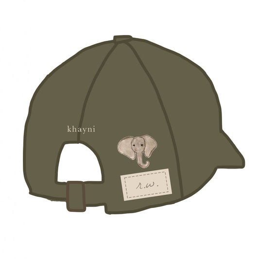 Organic cotton cap with baby elephant embroidery, leather patch detail and leather strap