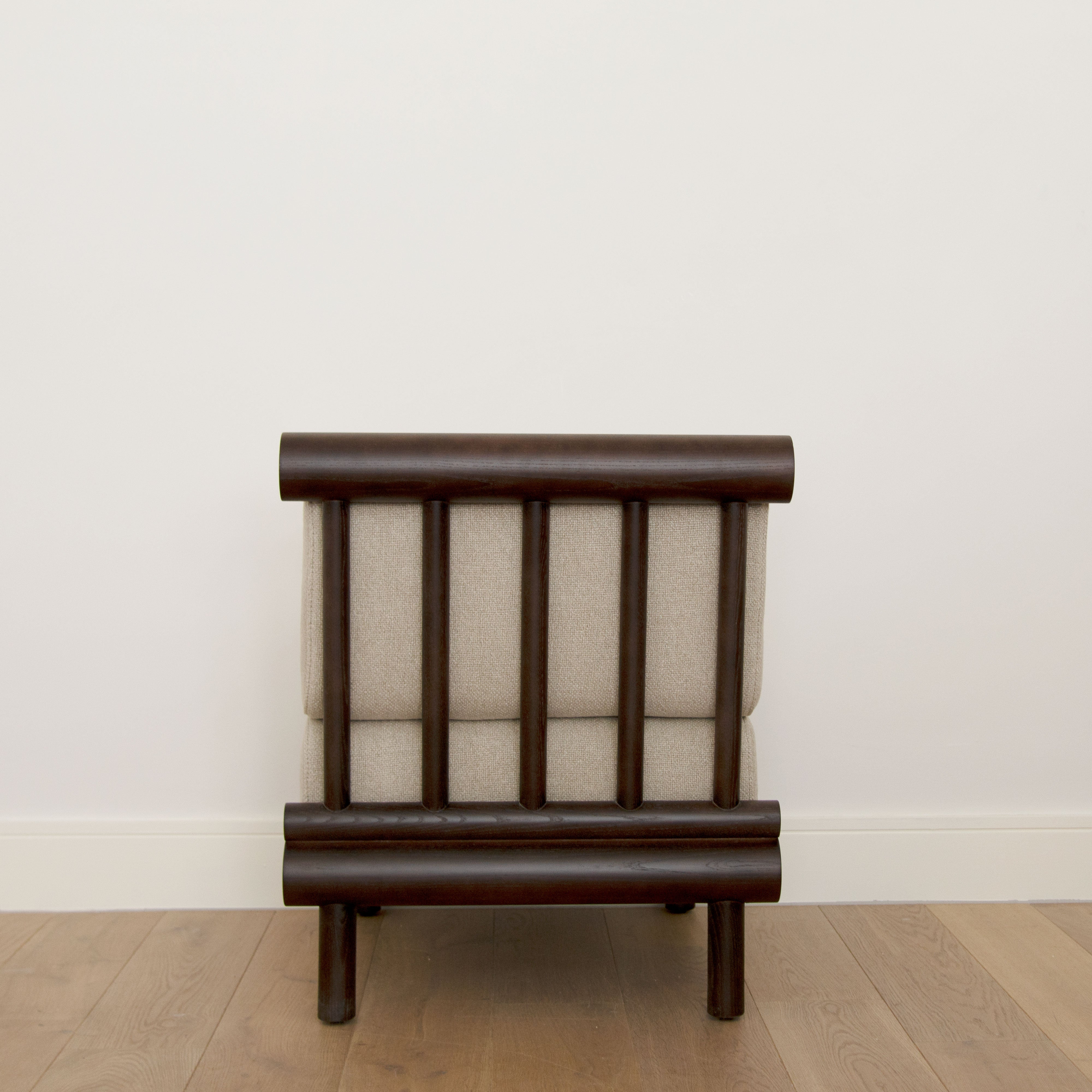 Rear view of the Khayni Oren in Soft Clay lounge chair