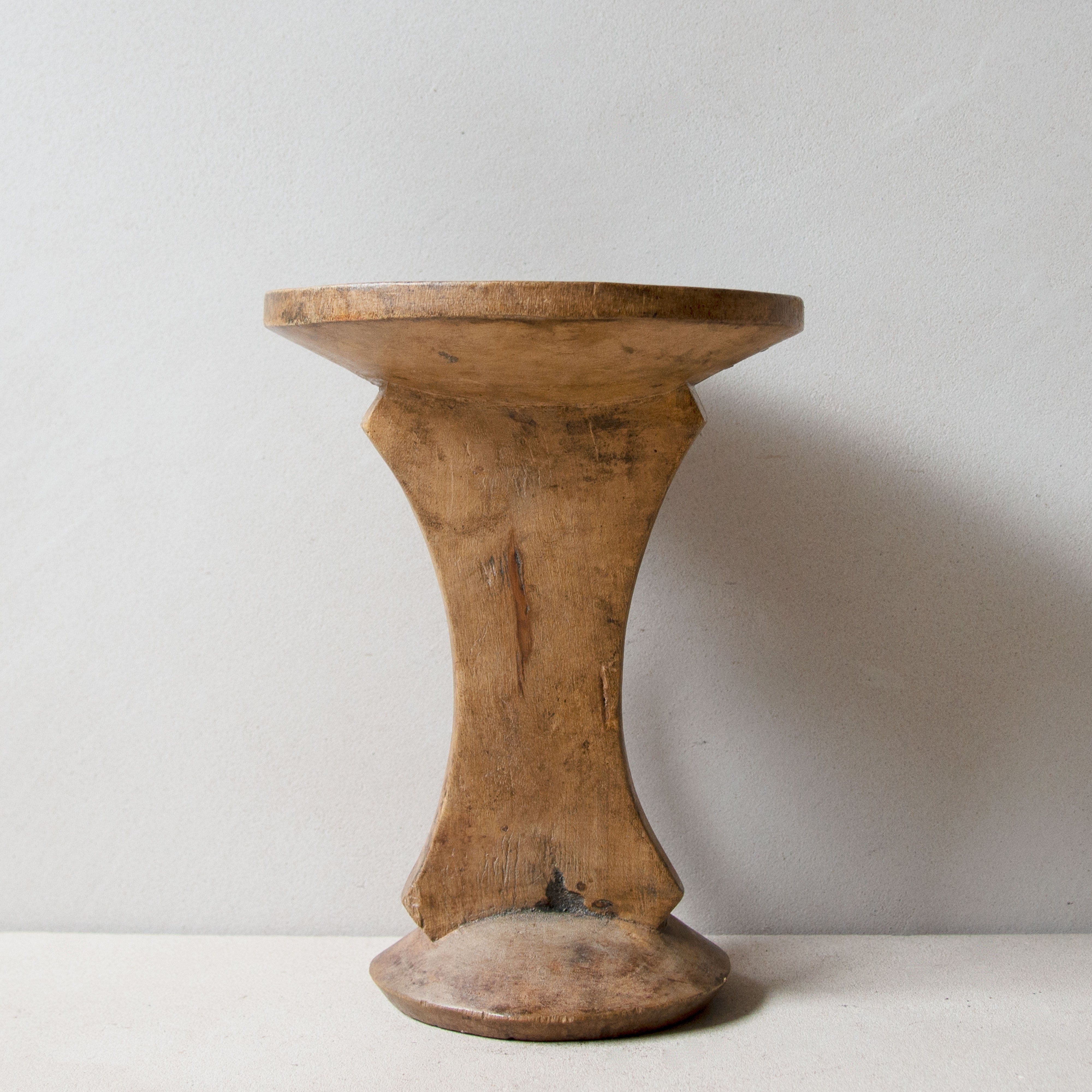 Rear view of Khayni's hand-carved Pokot stool No.9